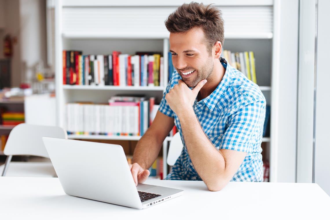 man on laptop learning through projects online