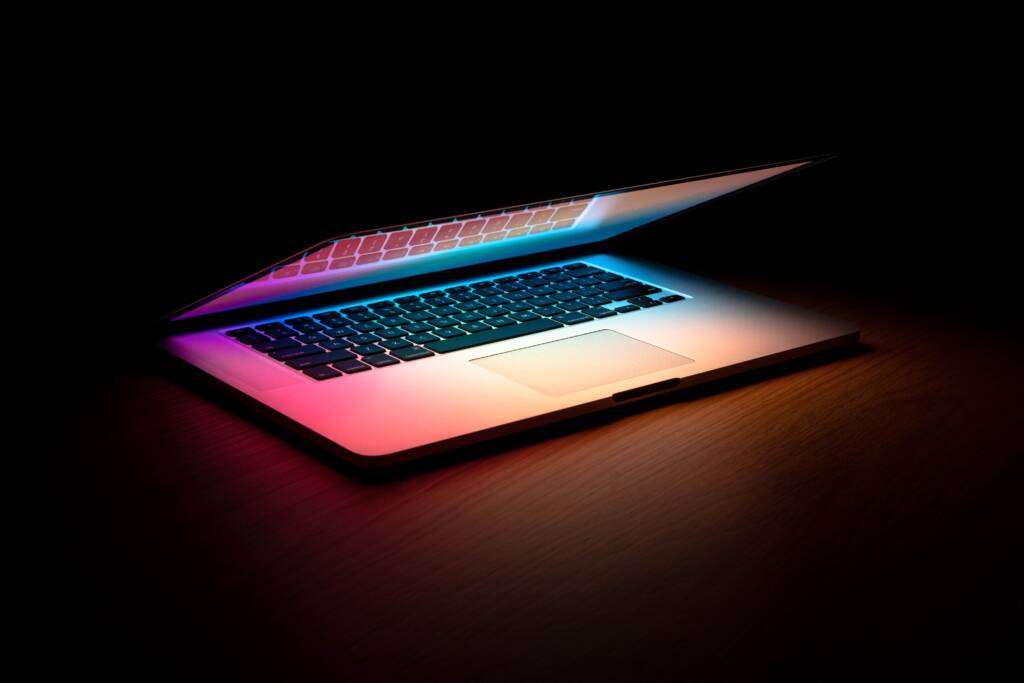 laptop slightly opened glowing