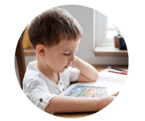 child complete schoolwork on tablet