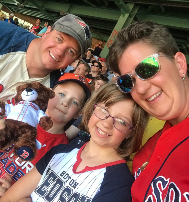 VLACS instructor at baseball game with family