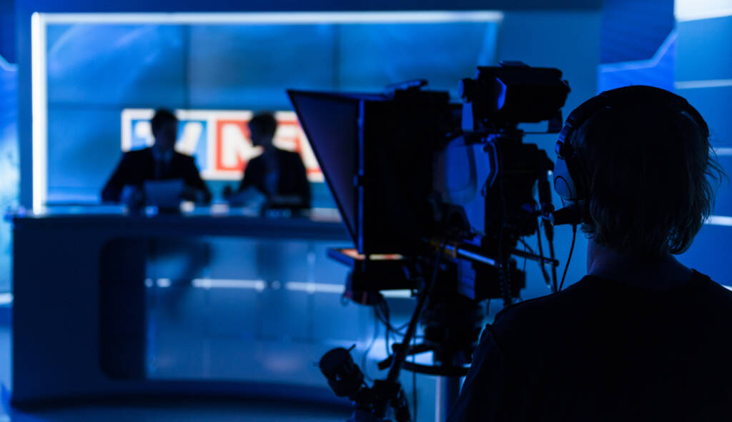 Newsreaders In Television Studio