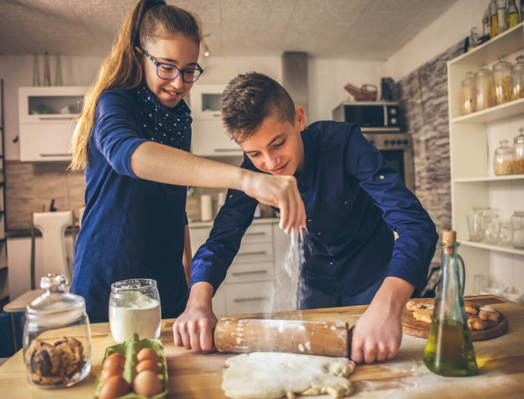 family funny kids bake cookies in kitchen